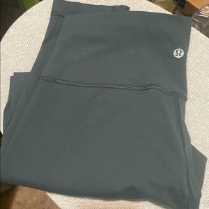 Used lululemon leggings dark olive green color